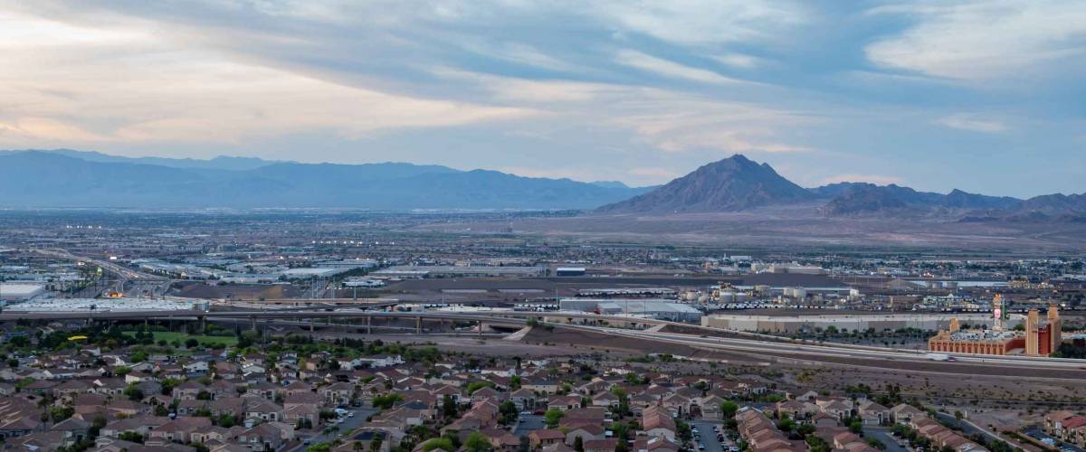 Sunset high angle view of the Frenchman Mountain and cityscape from Henderson View Pass at Nevada