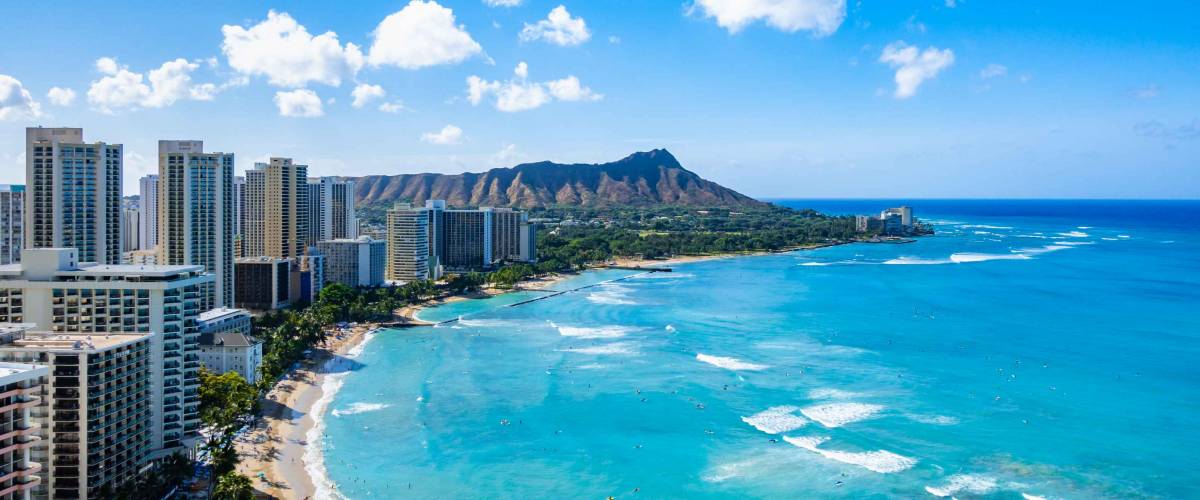 Waikiki Beach and Diamond Head Crater including the hotels and buildings in Waikiki, Honolulu, Oahu island, Hawaii.