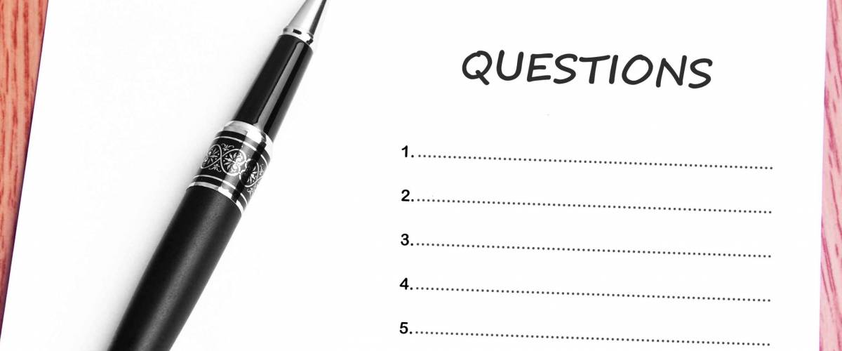 Close Up Black Pen And Paper On The Table And Questions List