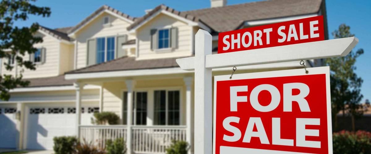 Short Sale Home For Sale Real Estate Sign and House - Right Side.