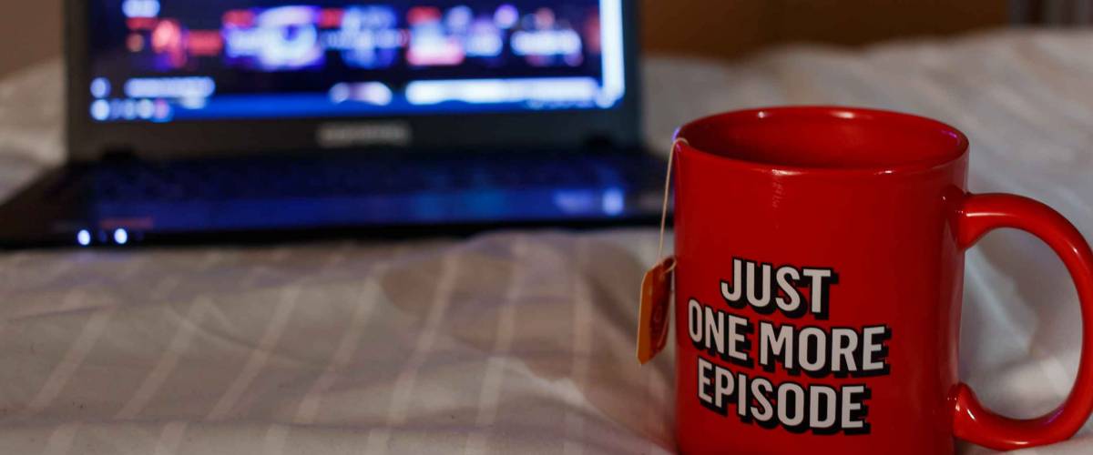 Watching series with a cup of tea. Just one more episode.