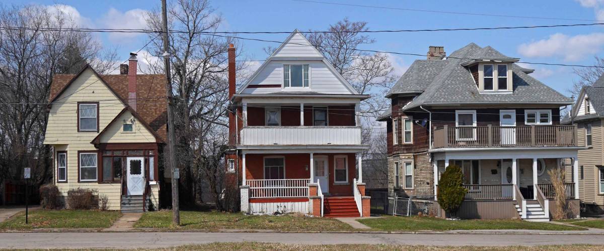 row of older houses in American suburb
