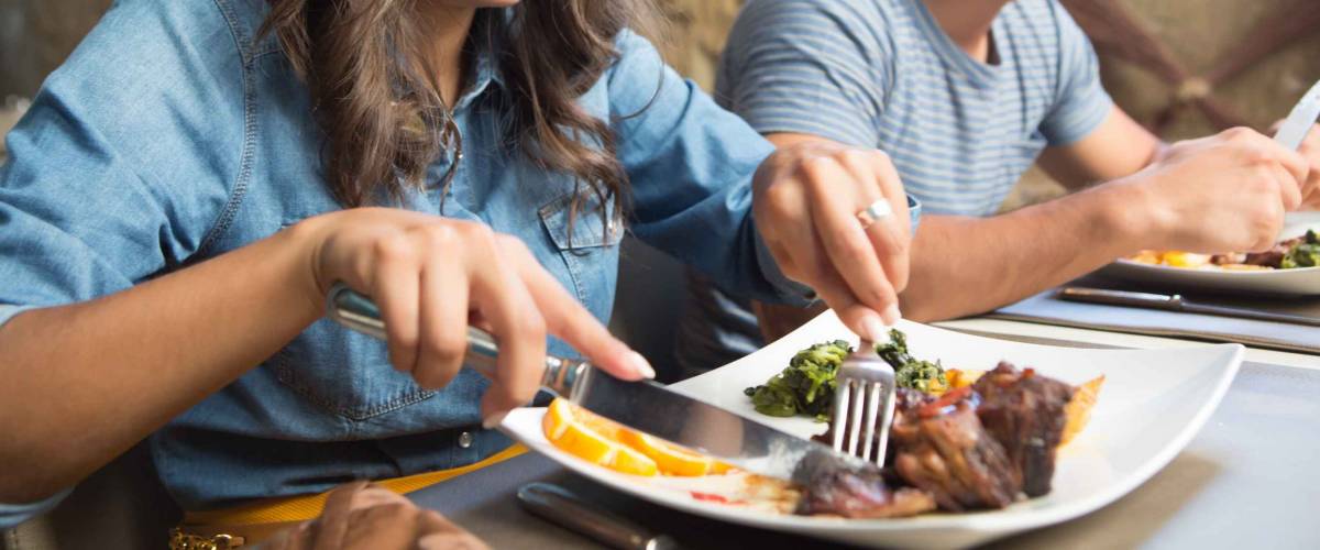 Couple having lunch at rustic gourmet restaurant