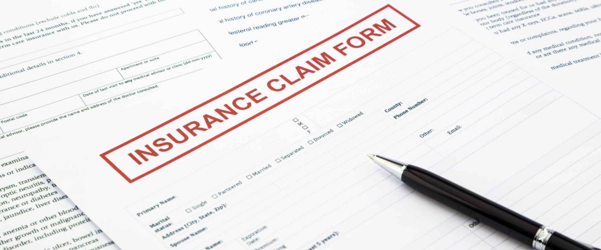 insurance claim form, paperwork and legal document