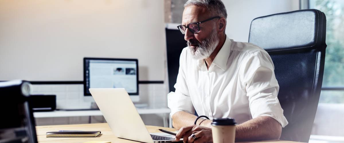 Man checking his investments online