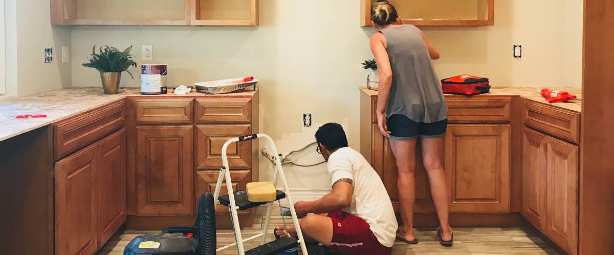 Couple renovating a home.