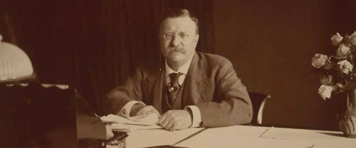 President Theodore Roosevelt (1858-1919), at his desk, 1907.