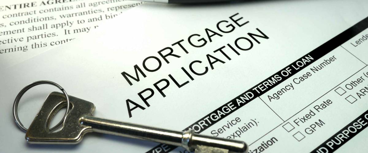pen and key on mortgage application form