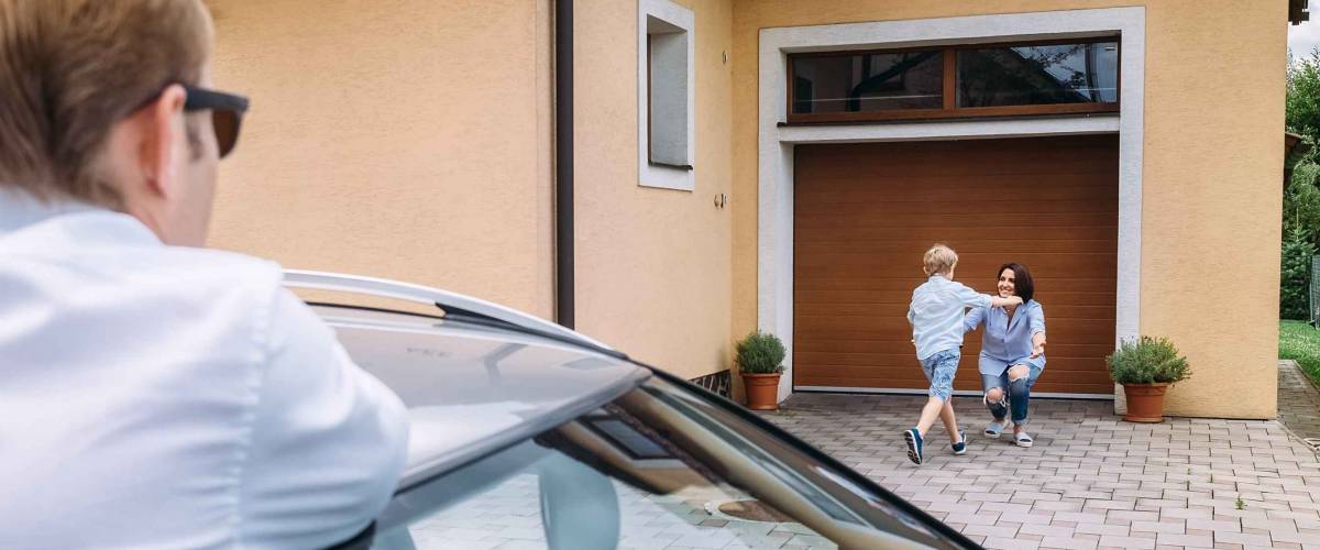 Dad with car dropping off kid to mom's house