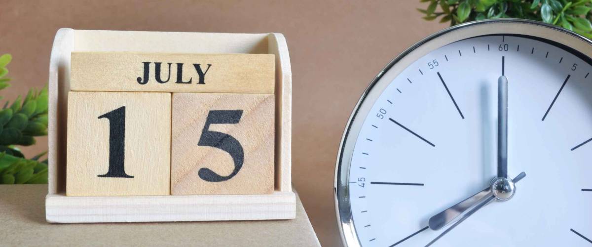 July 15, Cover design with silver - white clock in natural concept.