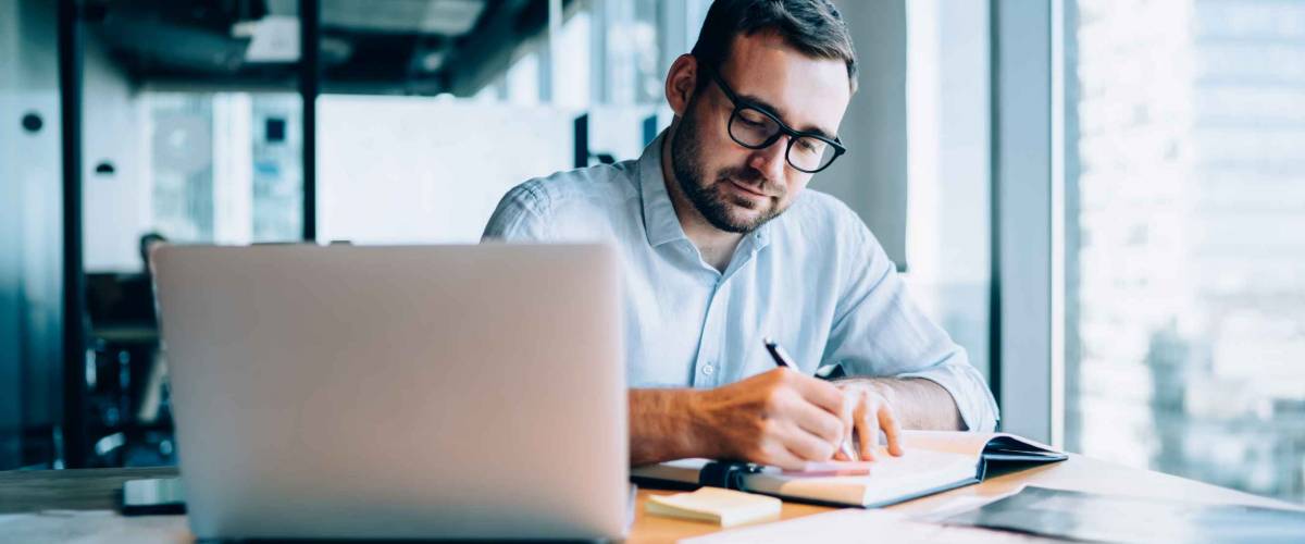 Professional expert working out college expenses.