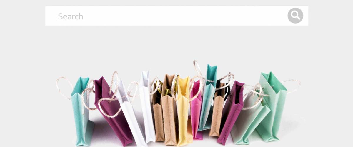 E-commerce online shopping concept. Miniature of reusable grocery bags.