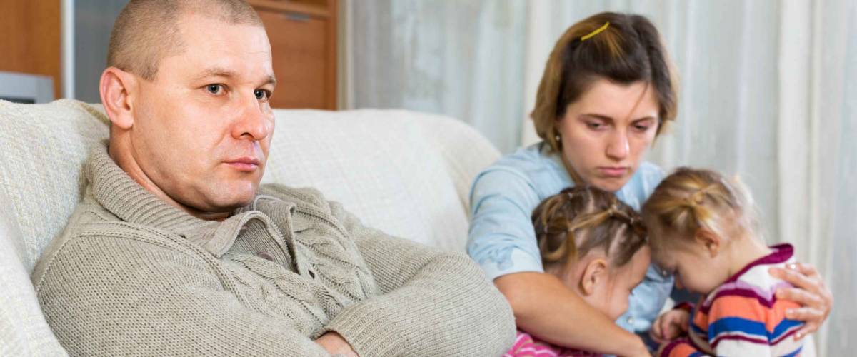 Family with two little children having conflict at home