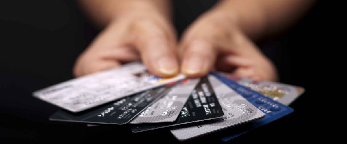 A concept image of credit cards fanned out to pick one.