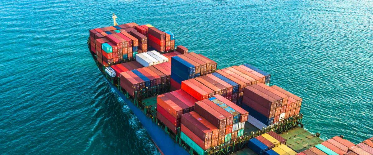 Aerial view container cargo ship, import export commerce business trade logistic and transportation of International by container cargo ship boat in the open sea, Freight shipping maritime.