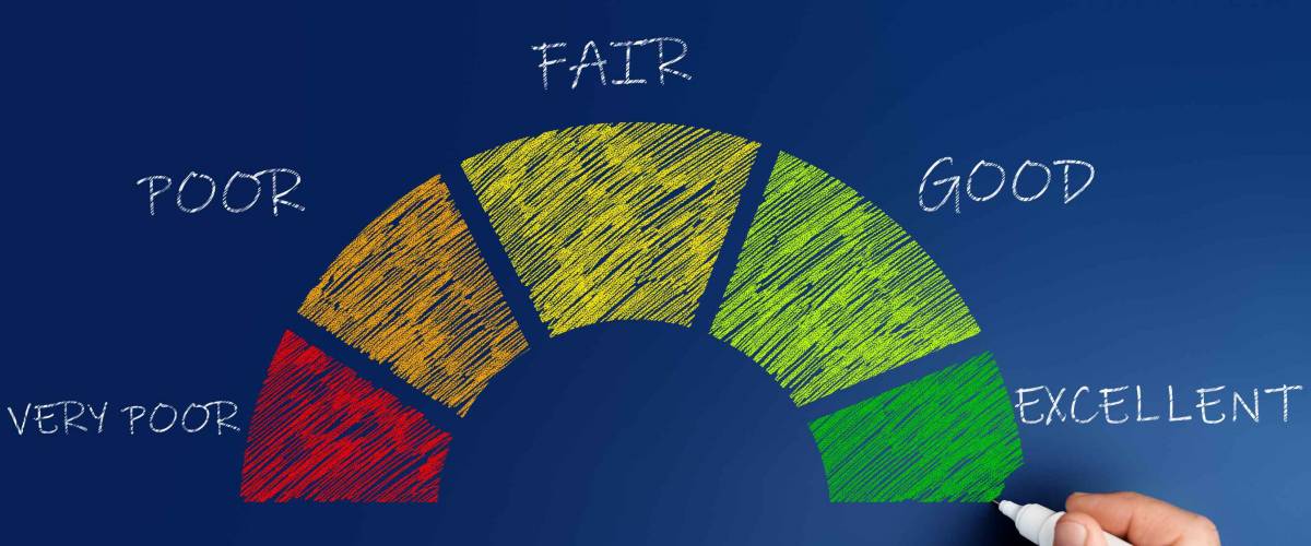 credit score concept, male hand draws a chart with credit history values.
