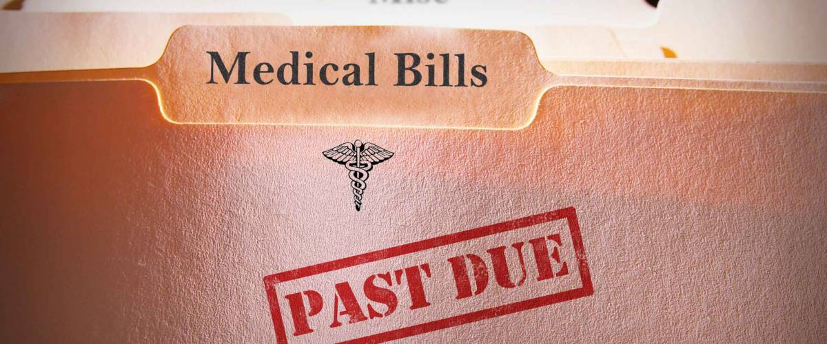 File folders with Past Due Medical Bills text