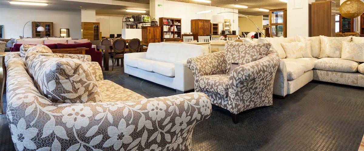 A big shop with various pieces of furniture