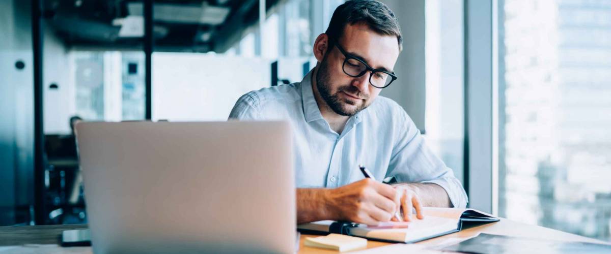 Professional expert working with information for business report.