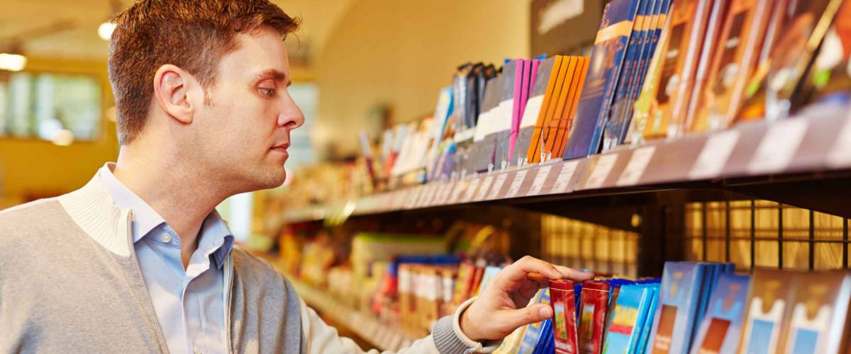 Man selects chocolate bar