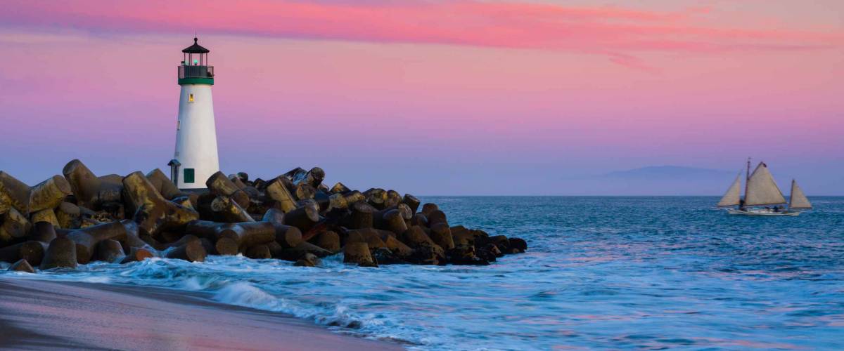Santa Cruz Breakwater Lighthouse in Santa Cruz, California at sunset