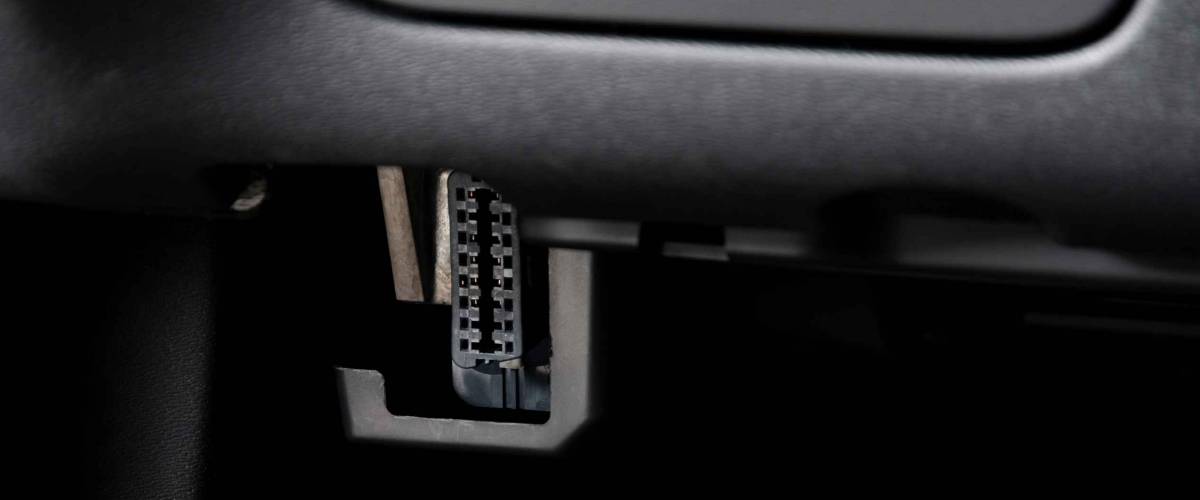 Automotive Electronic Diagnostic port OBD II under car dashboard