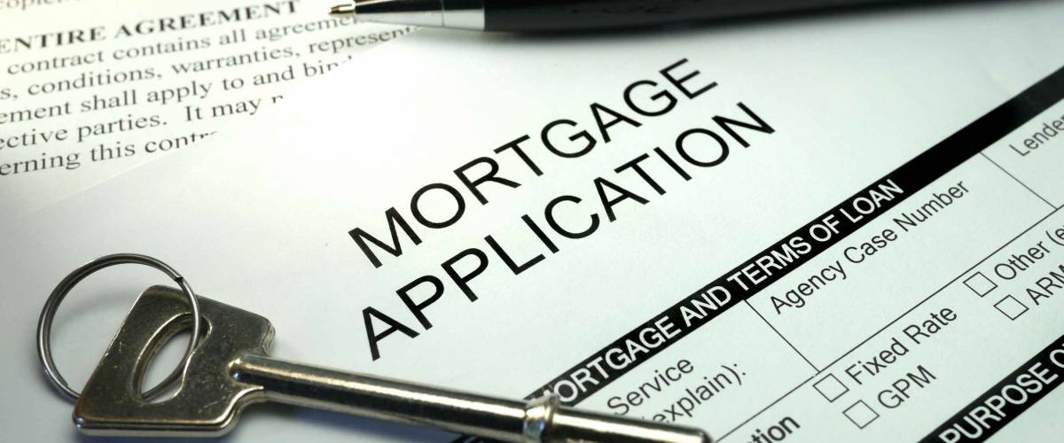 pen and key on mortgage application form