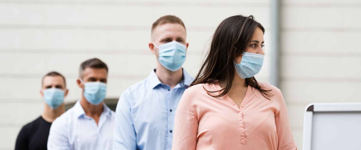 Job Center Line Of Jobless Unemployed Recruitment Seekers With Face Masks