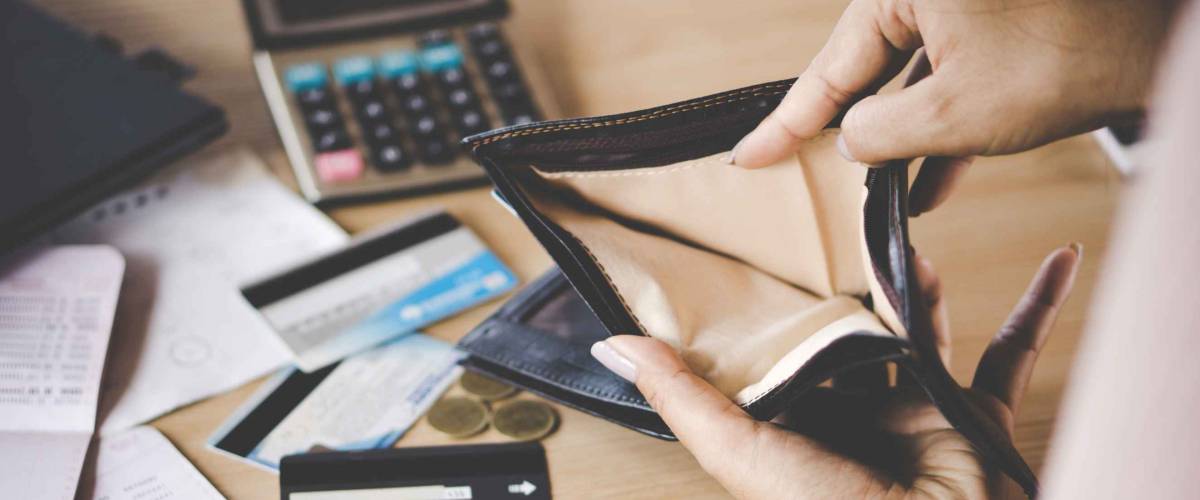 Looking for money in empty wallet