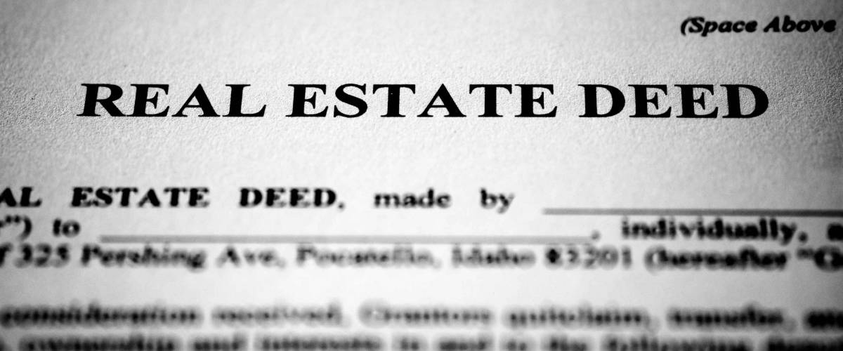 Real estate deed to transfer ownership of land or property