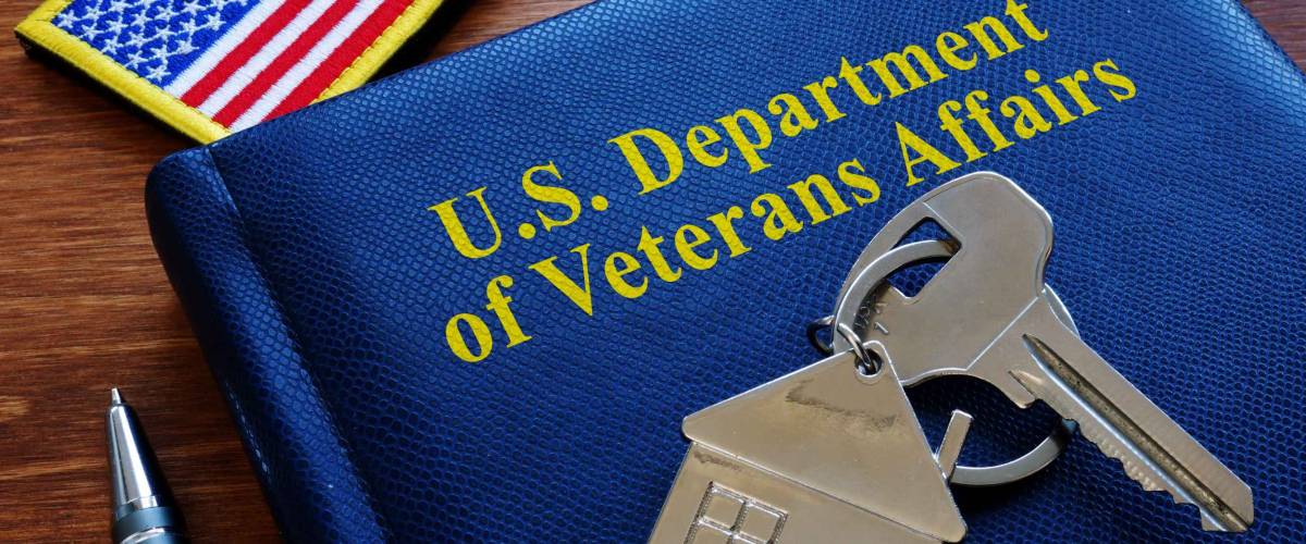 VA loan US Department of Veterans Affairs documents and flag.