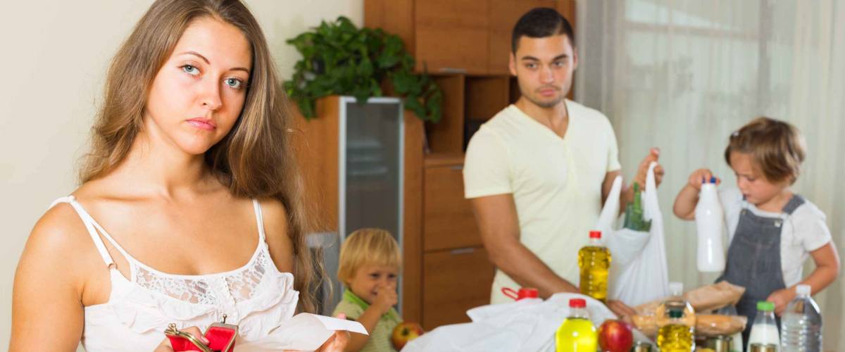 Upset woman with receipt from store, family brought food home