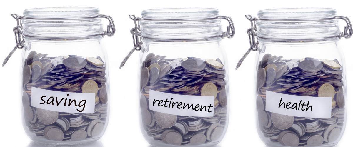 Glass jars full with coins: Saving, retirement and health text
