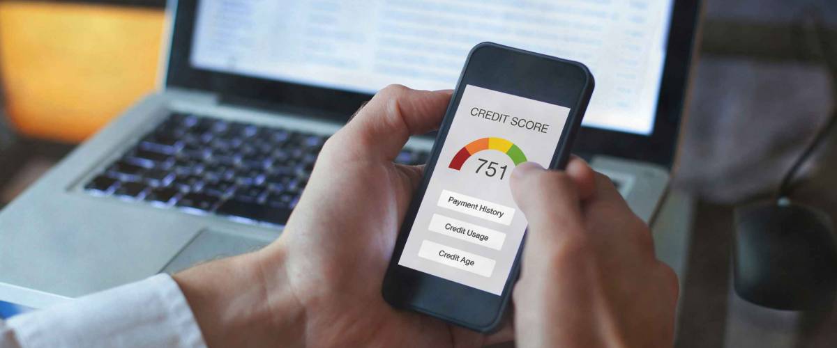 credit score concept on the screen of smartphone, checking payment history and ranking in bank