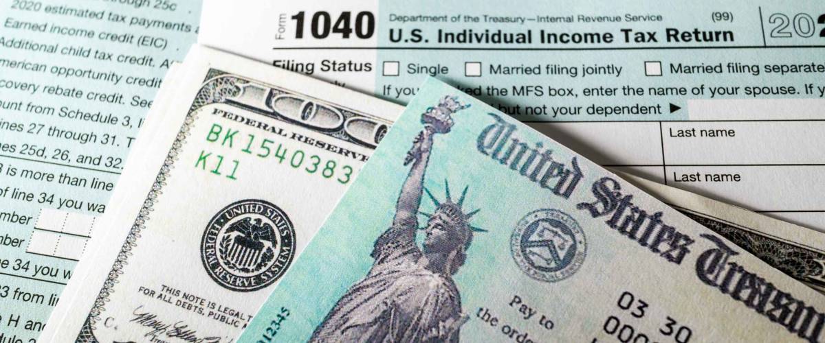 Stimulus economic tax return check and and 1040 Form.