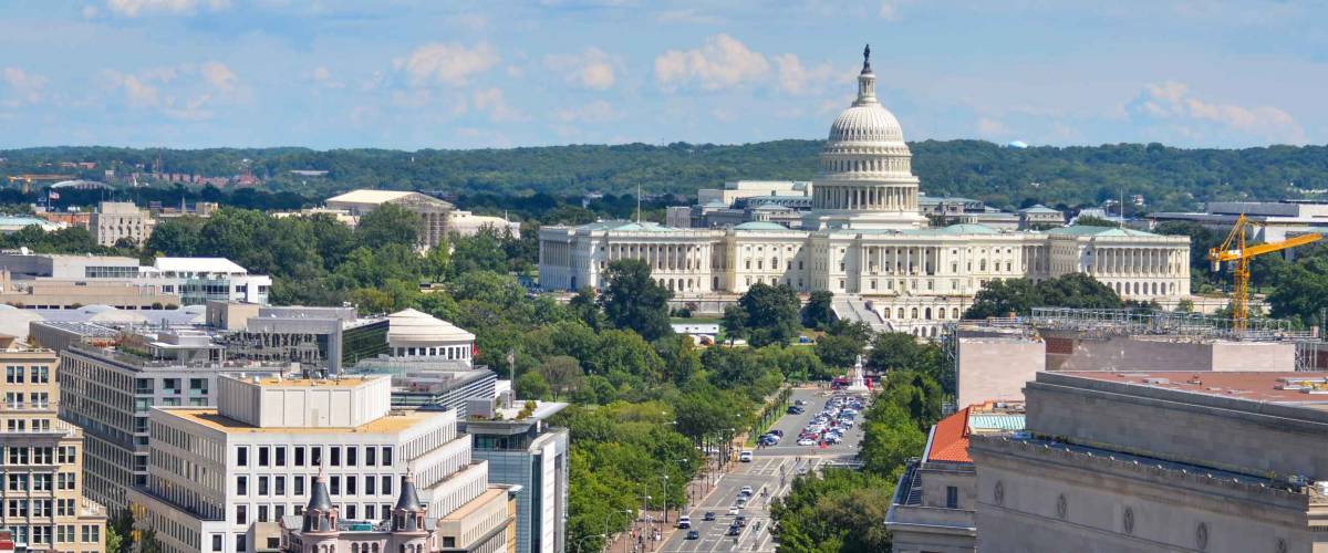 Washington DC - Aerial view of Pennsylvania street with federal buildings including US Archives building, Department of Justice and US Capitol