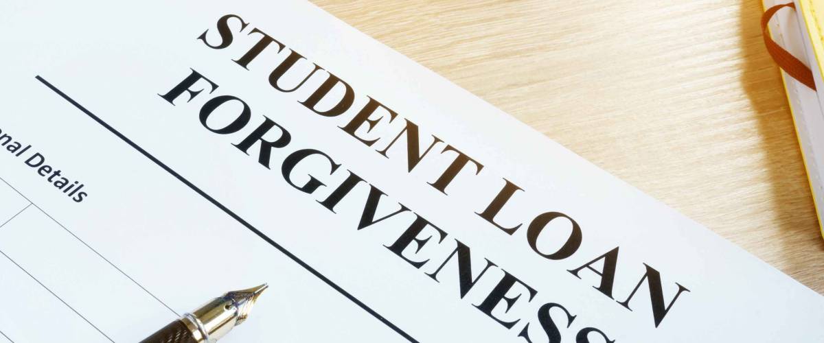 Student loan forgiveness form on a desk.