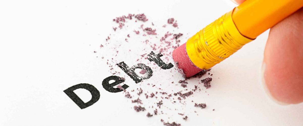 Debt being erased by the end of a pencil, word implies debt