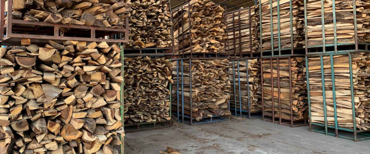 Stacks of firewood for industrial. Piles of firewood