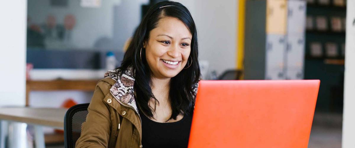 latin business woman working with computer at the office in Mexico city
