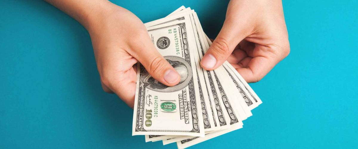 Man counting money, economy concept, allocation of money
