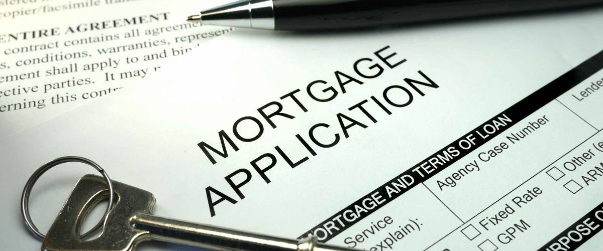 pen and key on mortgage application form