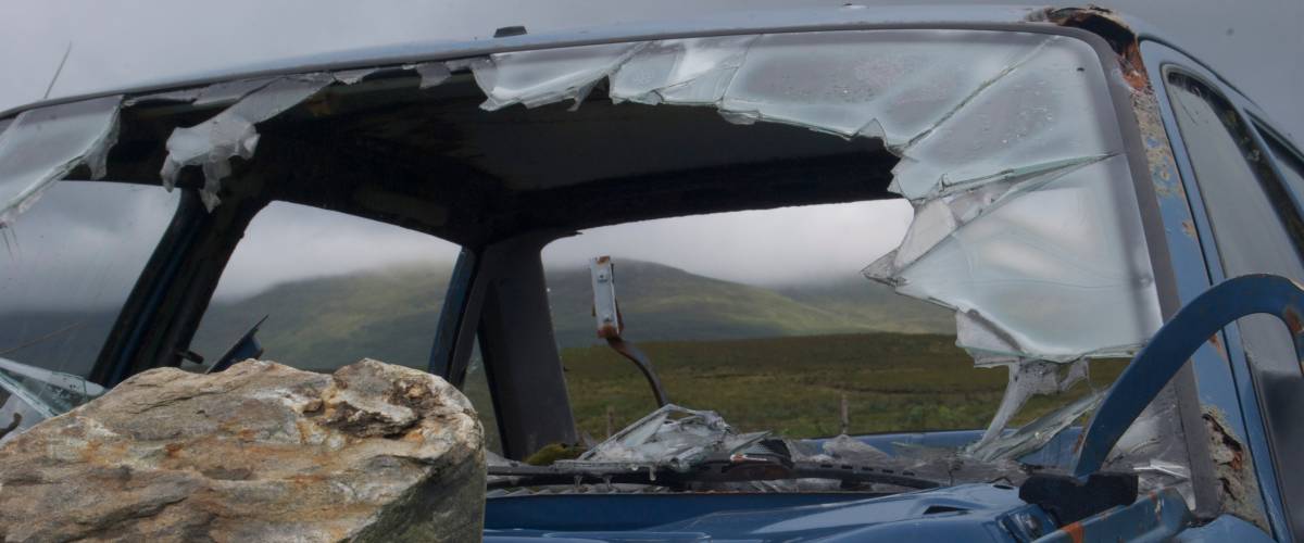 Car with windshield smashed
