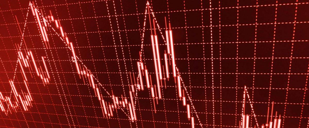 Data on live computer screen. Crisis crash recession downfall fail and loss. Stock market graph and bar chart price display. Abstract financial background trade colorful red abstract.