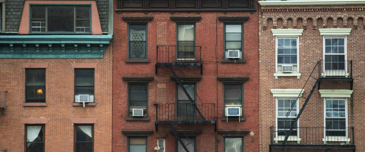 Old apartment buildings and fire escapes, New York City