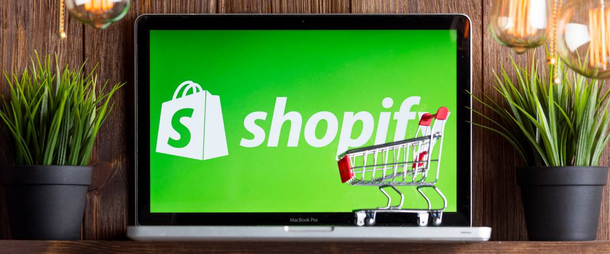 Shopify on the laptop screen isolated.