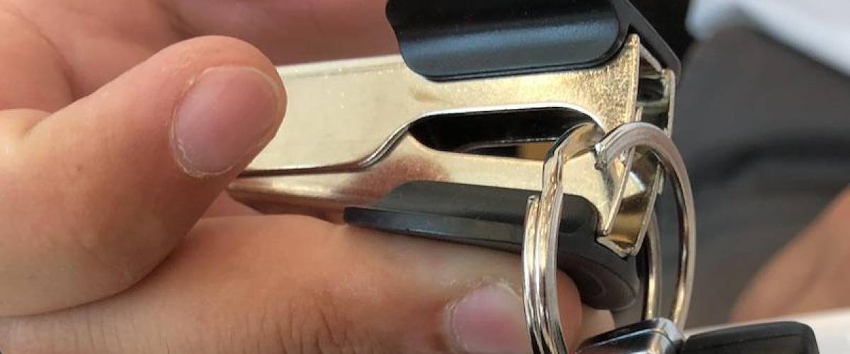 Opening key ring with staple remover