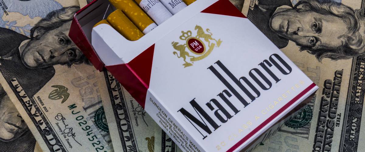 Pack of Marlboro Cigarettes and Twenty Dollar Bills