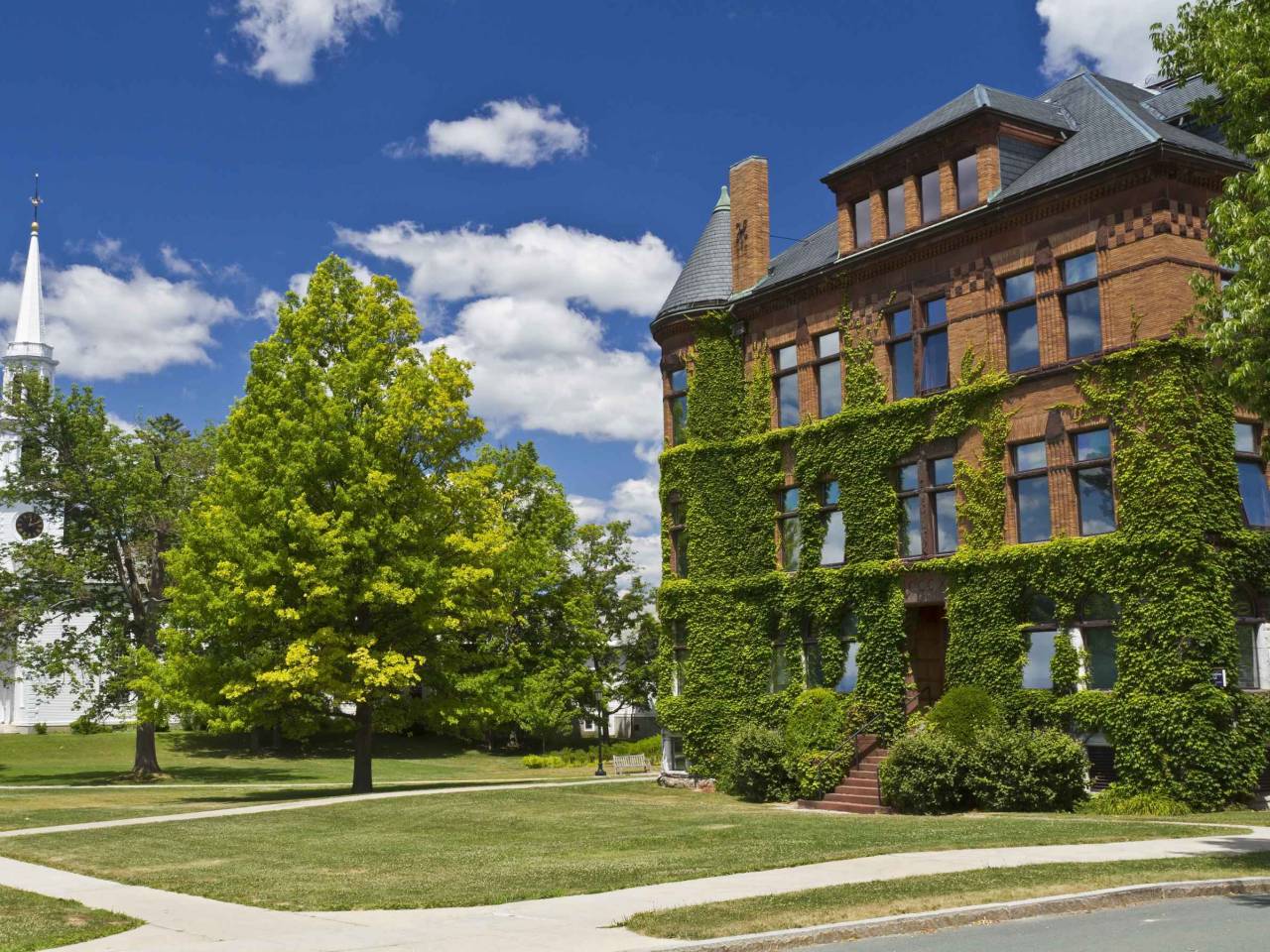 Hopkins Hall and First Congregational Church at Williams College in Williamstown, Massahusetts on a beautiful summer's day.