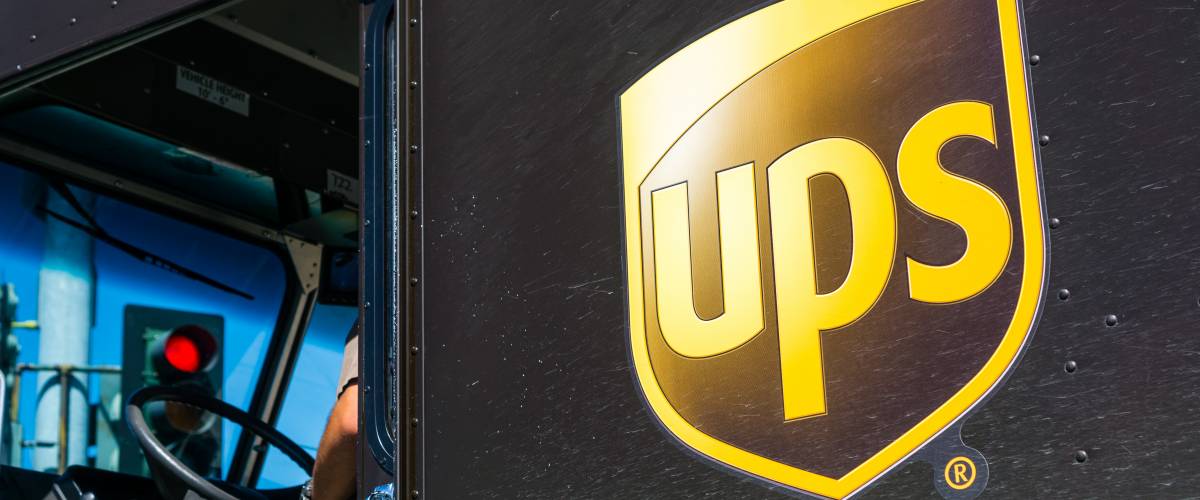 Close up of UPS logo printed on a delivery truck